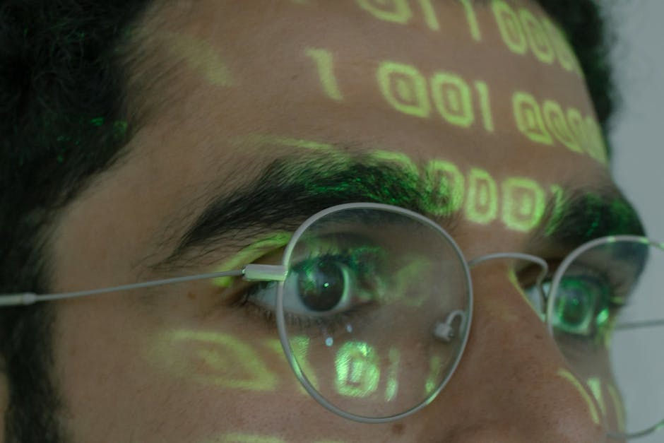 An image showing a person wearing a digital shield and holding a lock symbol, representing the concept of cybersecurity protection.