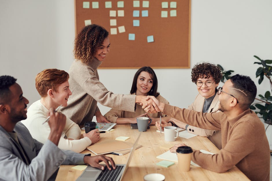 A group of professionals discussing cybersecurity strategies